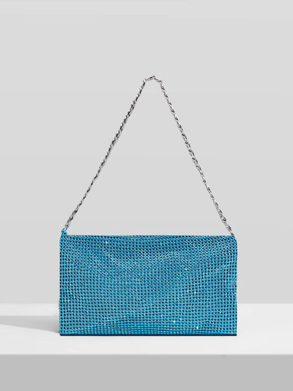 Bolso de hombre con cadena y detalle de diamantes preciosos